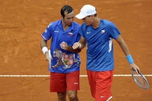 Czech Republic's Tomas Berdych (L) talks with teammate Radek Stepanek during their 2012 Davis Cup semifinal doubles tennis match against Argentina's tennis players Eduardo Schwank and Carlos Berlocq, at Parque Roca stadium in Buenos Aires. Berdych and Stepanek won 6-3, 6-4, 6-3 to give the Czech Republic a 2-1 lead over Argentina