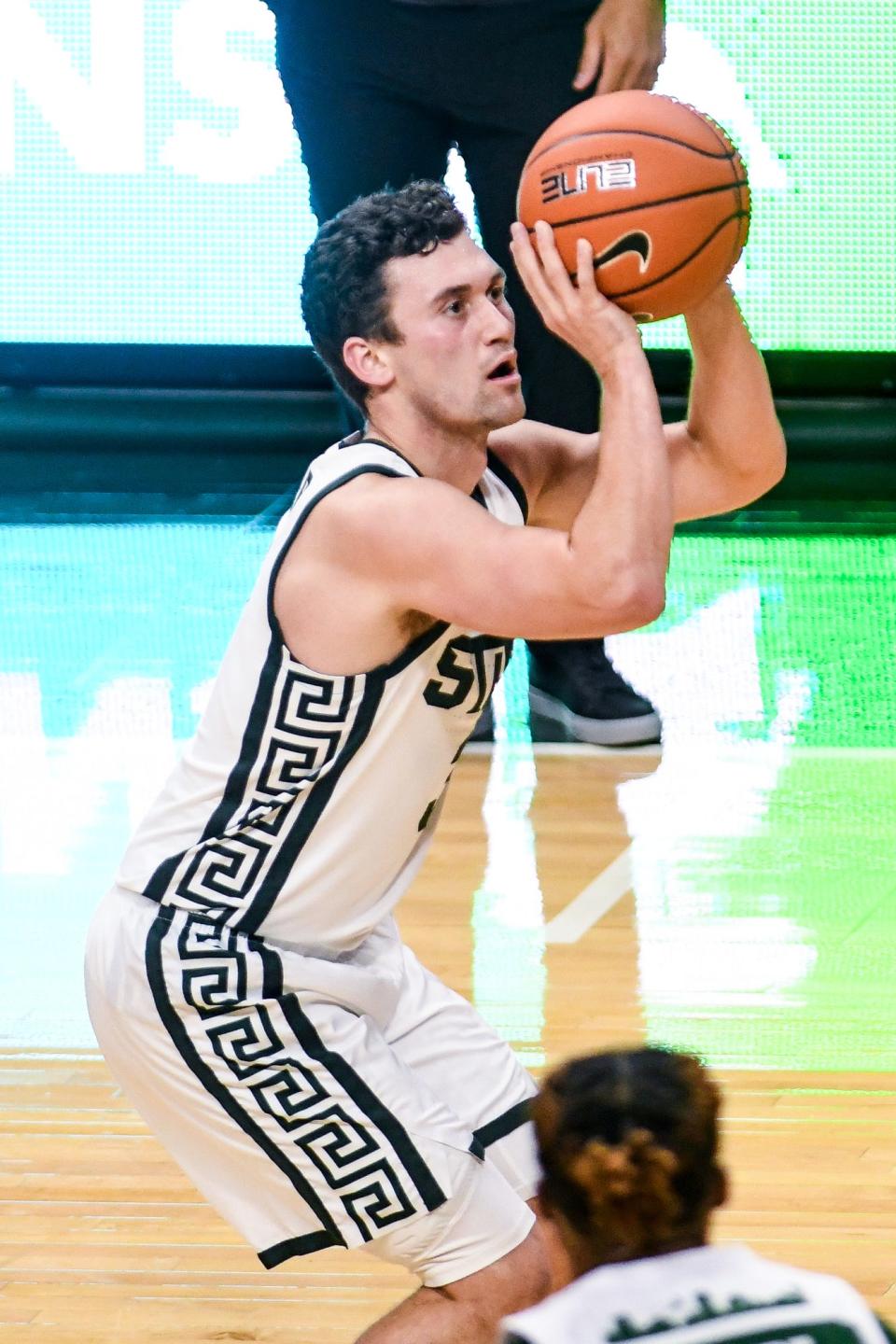 Michigan State's Foster Loyer makes a 3-pointer against Eastern Michigan's during the first half on Wednesday, Nov. 25, 2020, at the Breslin Center in East Lansing.
