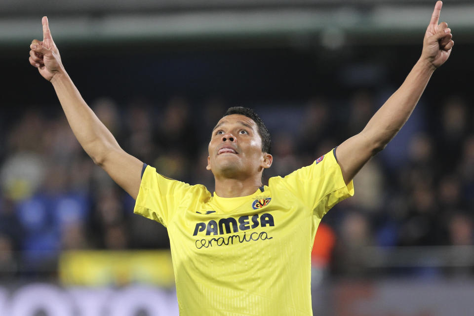 Villarreal's Carlos Bacca celebrates after scoring his side's second goal during a Europa League round of 16, 2nd leg soccer match between Villarreal and Zenit St.Petersburg at the Ceramica stadium in Villarreal, Spain, Thursday March 14, 2019. (AP Photo/Alberto Saiz)