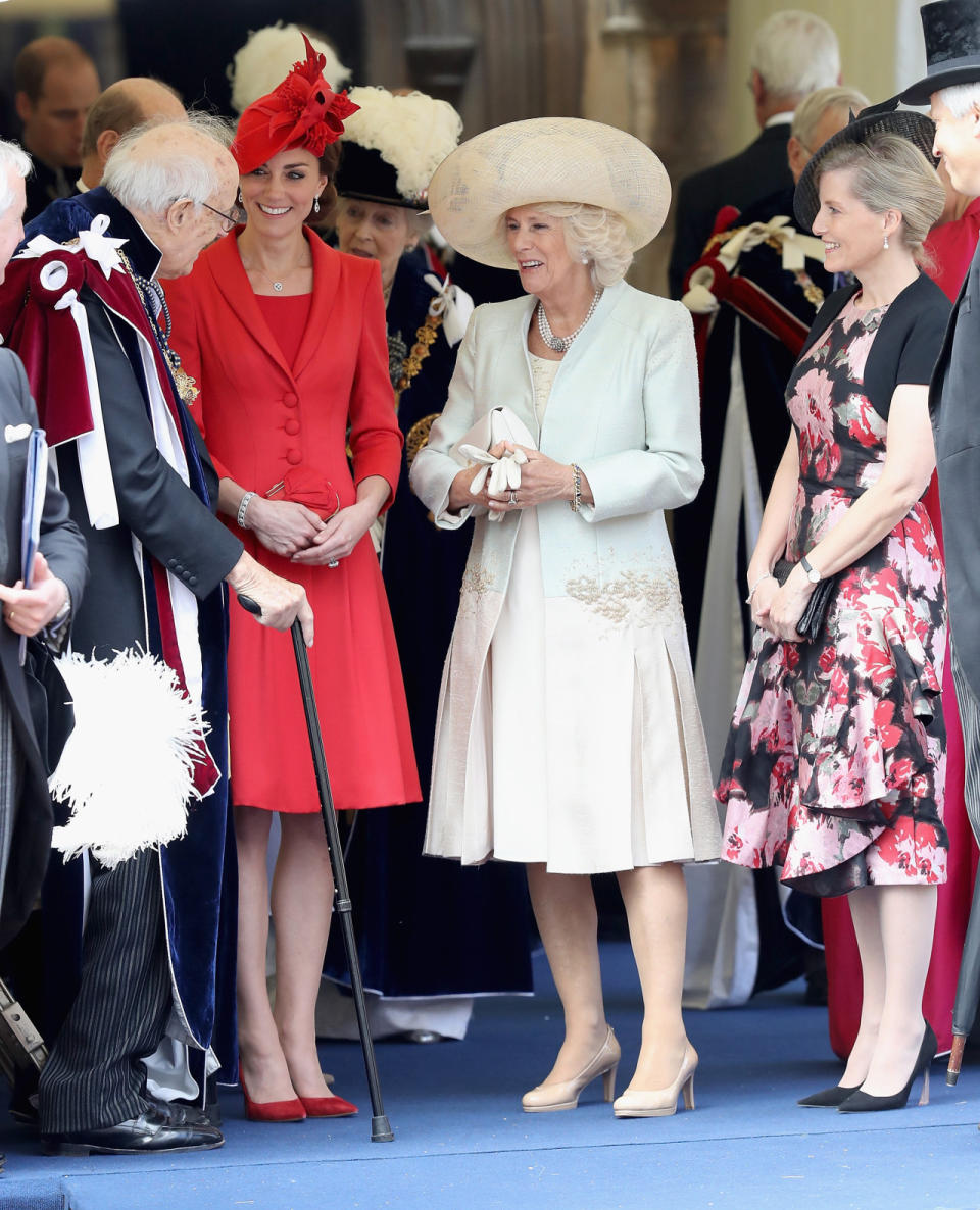 The Duchess of Cambridge in a Catherine Walker ensemble paired with a matching Lock & Co hat, and stilettos at the Garter Service at Windsor Castle.