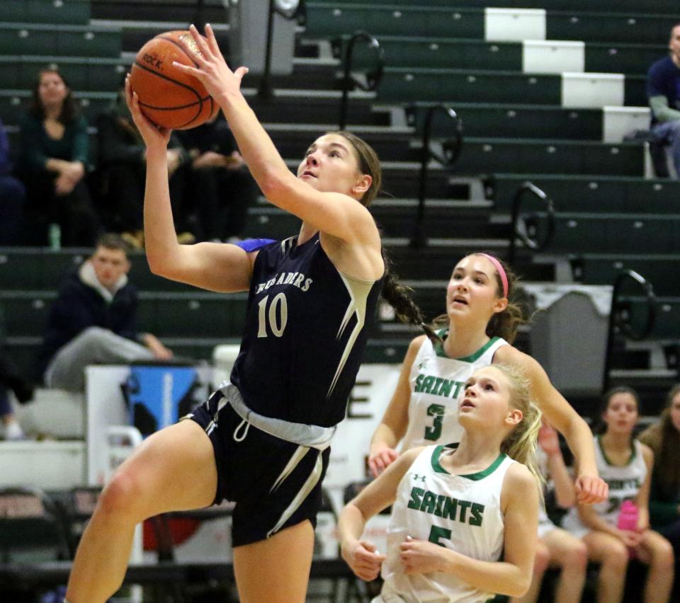 Elmira Notre Dame's Shannon Maloney goes in for a layup during a 51-29 win over Binghamton Seton Catholic Central in a girls regional semifinal at the Josh Palmer Fund Clarion Classic on Dec. 27, 2022 at Elmira High School.