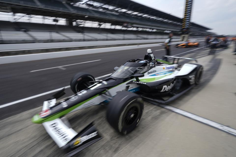 Takuma Sato, of Japan, leaves the pits during practice for the Indianapolis 500 auto race at Indianapolis Motor Speedway, Friday, May 19, 2023, in Indianapolis. (AP Photo/Darron Cummings)