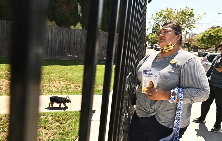 Los Angeles, California April 18, 2022- Community activist Eunisses Hernandez, who is running for L.A. City Council, passes out in flyers Glassell Park. (Wally Skalij/Los Angeles Times)