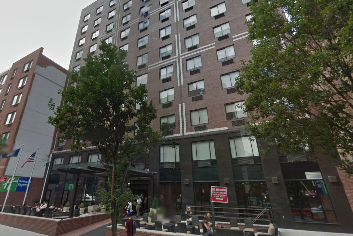 The teenager was found unresponsive and unconscious at the Holiday Inn Express hotel, West 48th Street, police said: Google