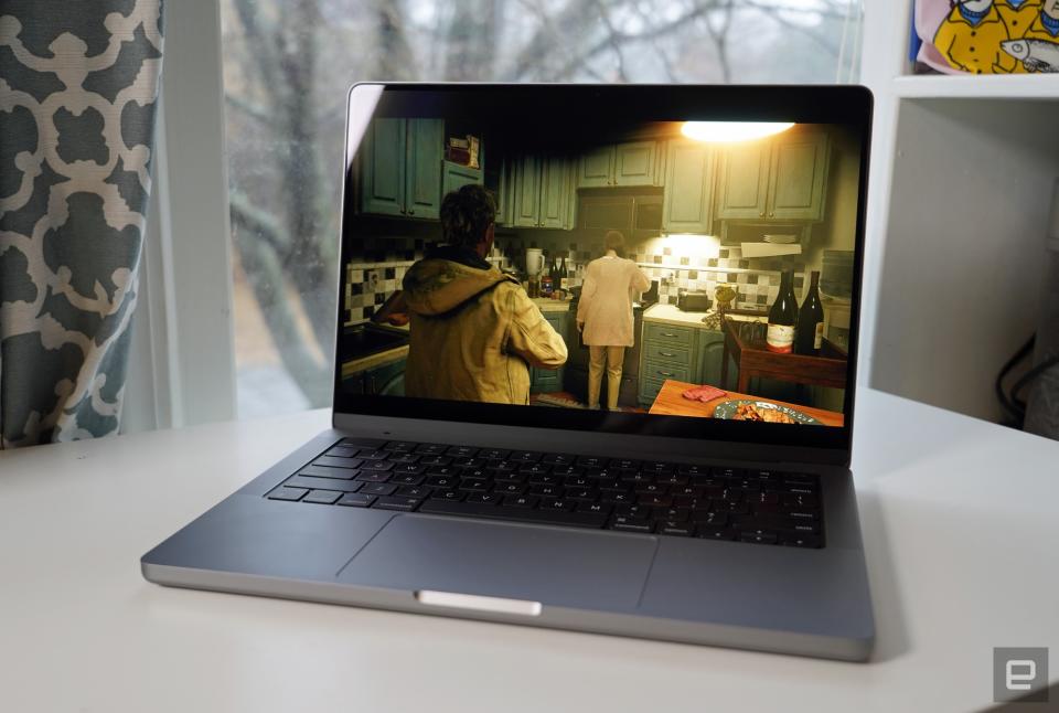 <p>MacBook Pro 14-inch (2022) running Resident Evil Village</p>
