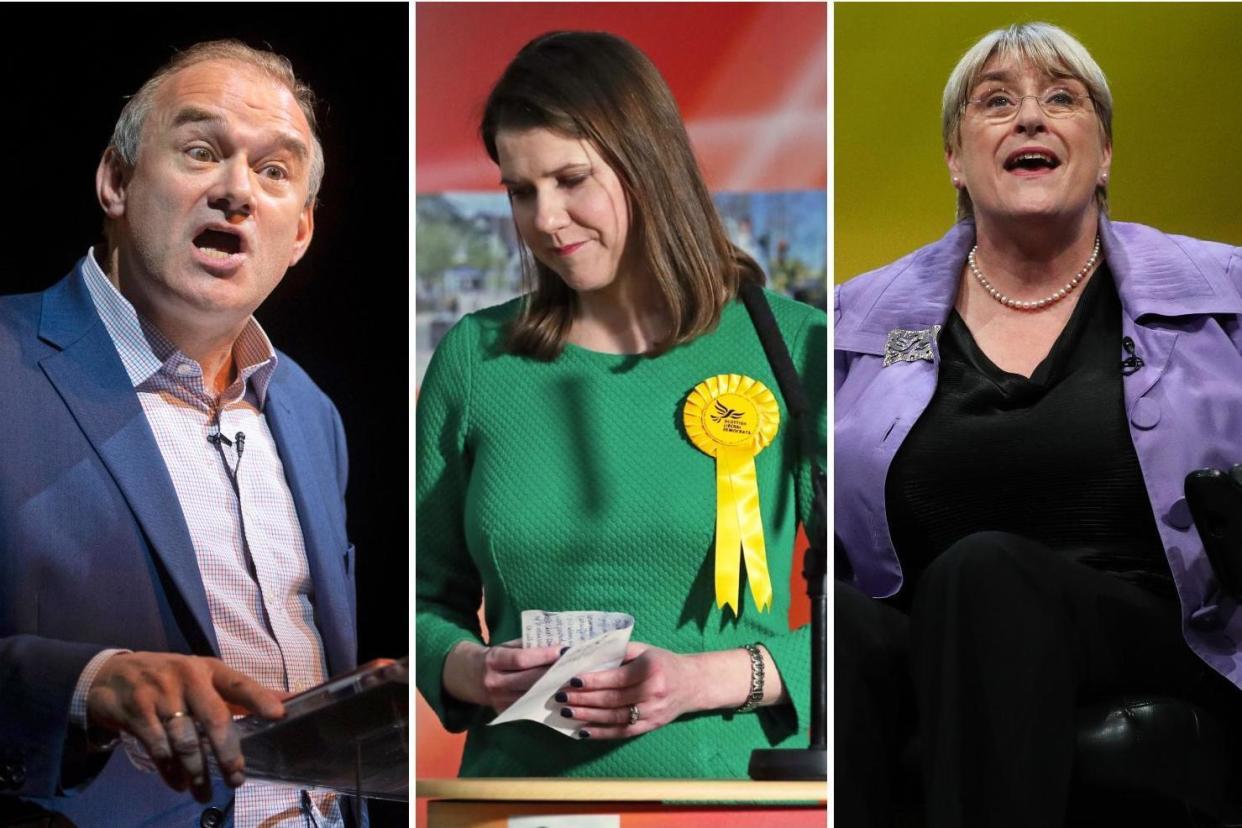 Baroness Sal Brinton (R) and Sir Ed Davey (L) will become the joint acting leaders of the Liberal Democrats following Jo Swinson's (C) election defeat