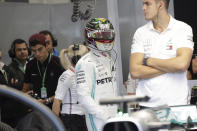 Mercedes driver Lewis Hamilton, of Britain,, center, prepares for the third free practice session for the Formula One Brazil Grand Prix auto race at the Interlagos race track in Sao Paulo, Brazil, Saturday, Nov. 16, 2019. (AP Photo/Silvia Izquierdo)