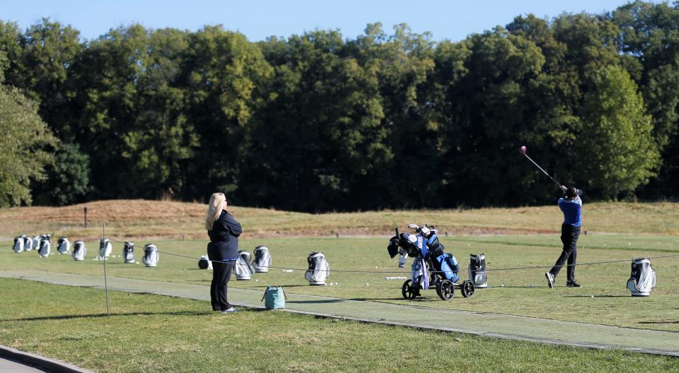 Centerville golfer Alex Goodwin is the last player on the driving range before the 2022 girls golf state tournament Sept. 30, 2022.
