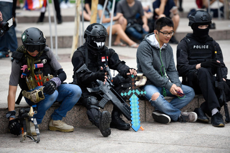 Cosplayers taking a break. (Photo: Bryan Huang/Yahoo Singapore)  