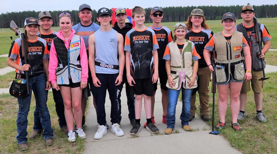 FILE - Mishicot High School FFA's 2023 state trap team members are, back row from left: Sawyer Sand, Logan Marshall, Josh Schmidt, Jakob Stöberl, Logan Campion and Fischer Schaus; and front row from left: McKenzie Wotachek, Vanessa Paquette, Logan Murphy, Donovan Anhalt, Trinity Popp and Emma Schmidt. Not pictured is Head Coach Katie Koeppel.