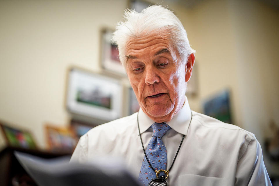 Rep Roger Williams, R-Texas, shows a picture of President John F. Kennedy at an event from the day he was assassinated. (Frank Thorp V / NBC News)