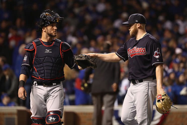 CHICAGO, IL - OCTOBER 30: Yan Gomes #10 (L) and Bryan Shaw #27 of the Cleveland Indians walk off the field after the eighth inning against the Chicago Cubs in Game Five of the 2016 World Series at Wrigley Field on October 30, 2016 in Chicago, Illinois. (Photo by Elsa/Getty Images)