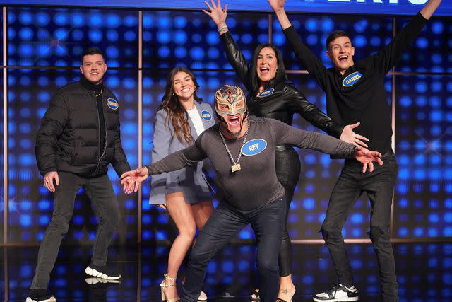 <p>Christopher Willard/ABC/Getty</p> Rey Mysterio and his family on 'Celebrity Family Feud'