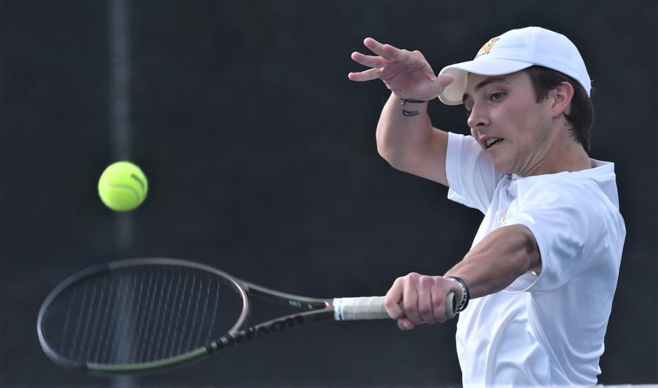 Abilene Wylie's Trevor Short returns a shot in his mixed doubles match against College Station's Maya Diyasheva and Paxton O'Shea. The College Station duo won the Class 5A championship match 4-6, 6-3, 6-4 on Wednesday at Northside Tennis Center in Helotes.