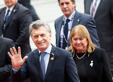 Argentina's President Mauricio Macri (L) and Foreign Minister Susana Malcorra arrive for the inauguration of President-elect Lenin Moreno (not pictured) at the National Assembly in Quito, Ecuador May 24, 2017. REUTERS/Henry Romero