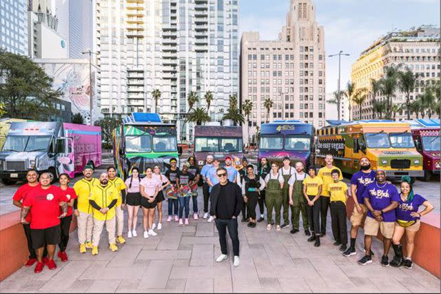 <p>Courtesy of Food Network</p> Tyler Florence filming The Great Food Truck Race.