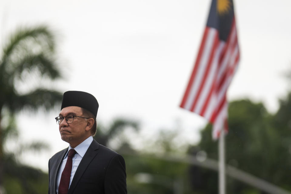 Malaysian Prime Minister Anwar Ibrahim attends a wreath-laying ceremony at Rizal Park in Manila, Philippines Thursday, March 2, 2023. (Lisa Marie David/Pool Photo via AP)