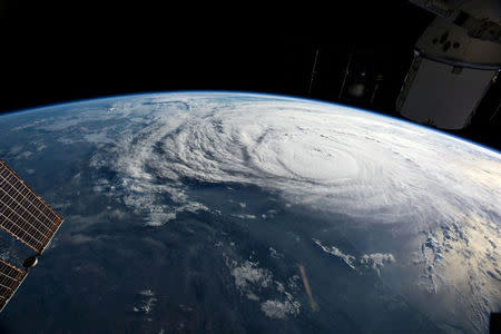 Hurricane Harvey is pictured off the coast of Texas, U.S. from aboard the International Space Station in this August 25, 2017 NASA handout photo. NASA/Handout via REUTERS