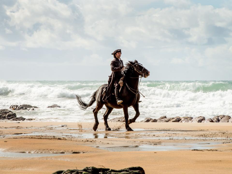 Riding out: Ross Poldark (Aidan Turner) on the beach: BBC