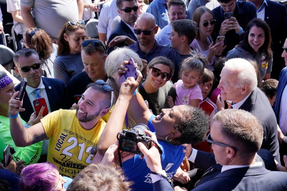 President Joe Biden wades through the crowd after speaking at the Labor Day event in Milwaukee (AP)