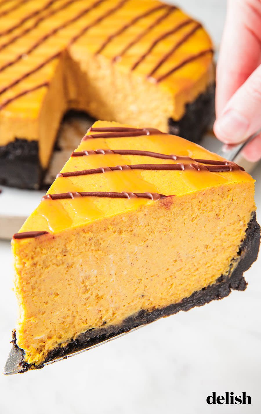 <p>Oreo crust? Count us in! </p><p>Get the recipe from <a href="https://www.delish.com/cooking/recipe-ideas/recipes/a50173/chocolate-pumpkin-cheesecake-recipe/" rel="nofollow noopener" target="_blank" data-ylk="slk:Delish;elm:context_link;itc:0;sec:content-canvas" class="link ">Delish</a>. </p>