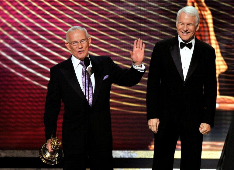 Lommy Smothers, recipient of the Commemorative award and presenter Steve Martin during the 60th Primetime Emmy Awards