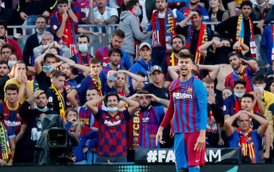 Barcelona fans look on in frustration - REUTERS