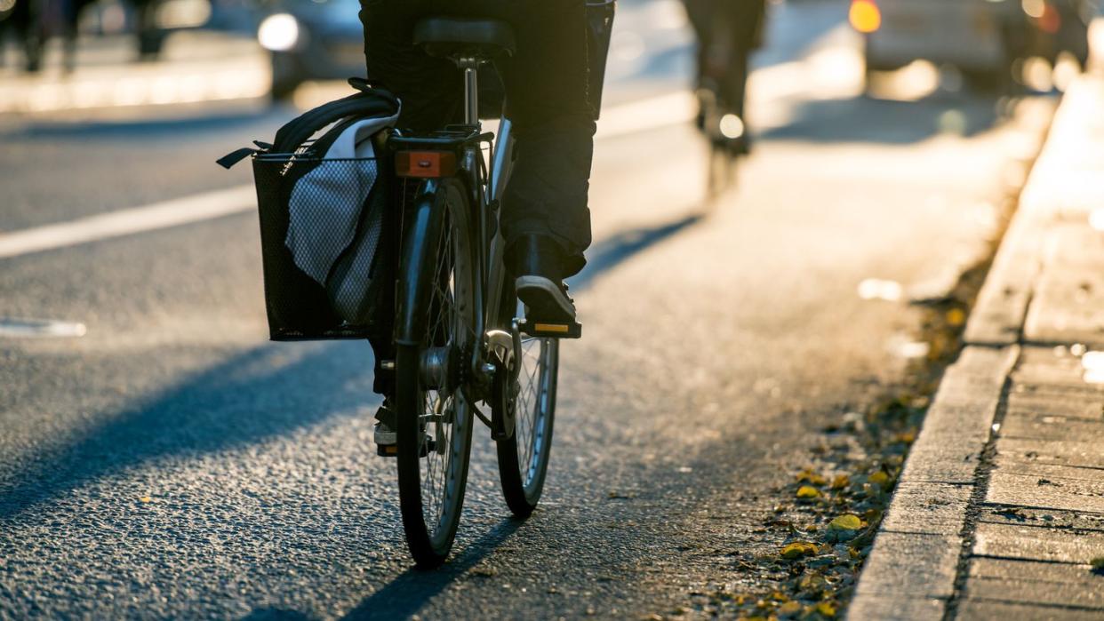 bicyclist in city traffic