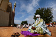 A man dressed in traditional attire is seen during Eid al-Adha prayers at the National Mosque, amid the outbreak of the coronavirus disease (COVID-19), in Abuja, Nigeria July 31, 2020. REUTERS/Afolabi Sotunde