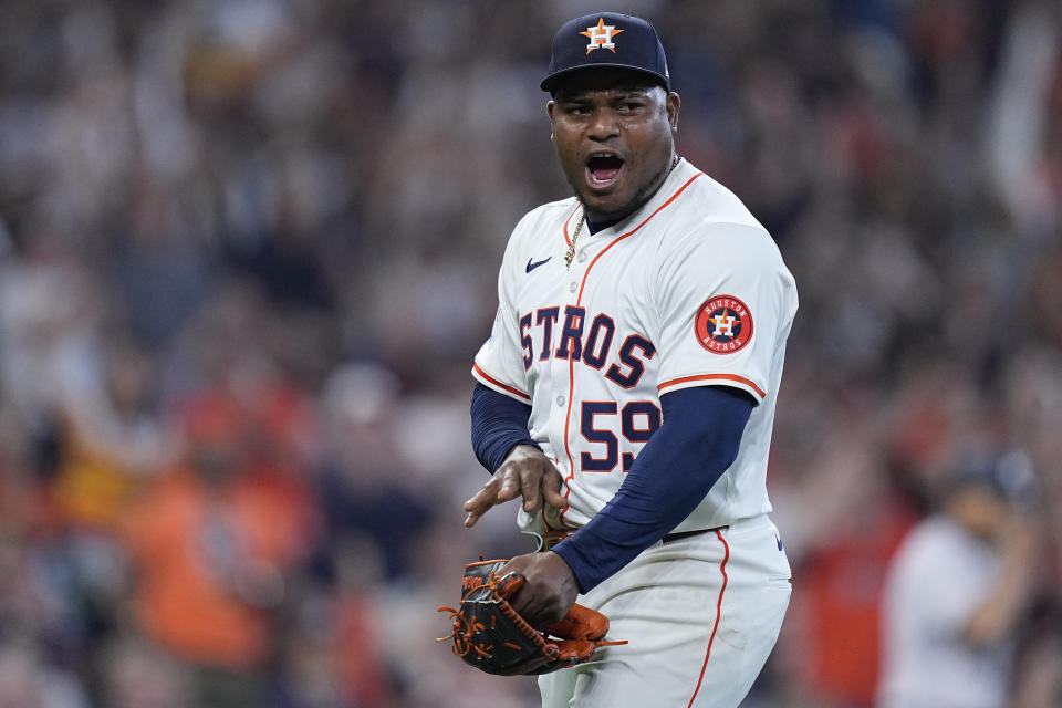 Houston Astros starting pitcher Framber Valdez celebrates after a double play got him out of a bases-loaded jam during the fourth inning of a baseball game against the New York Yankees, Thursday, March 28, 2024, in Houston. (AP Photo/Kevin M. Cox)