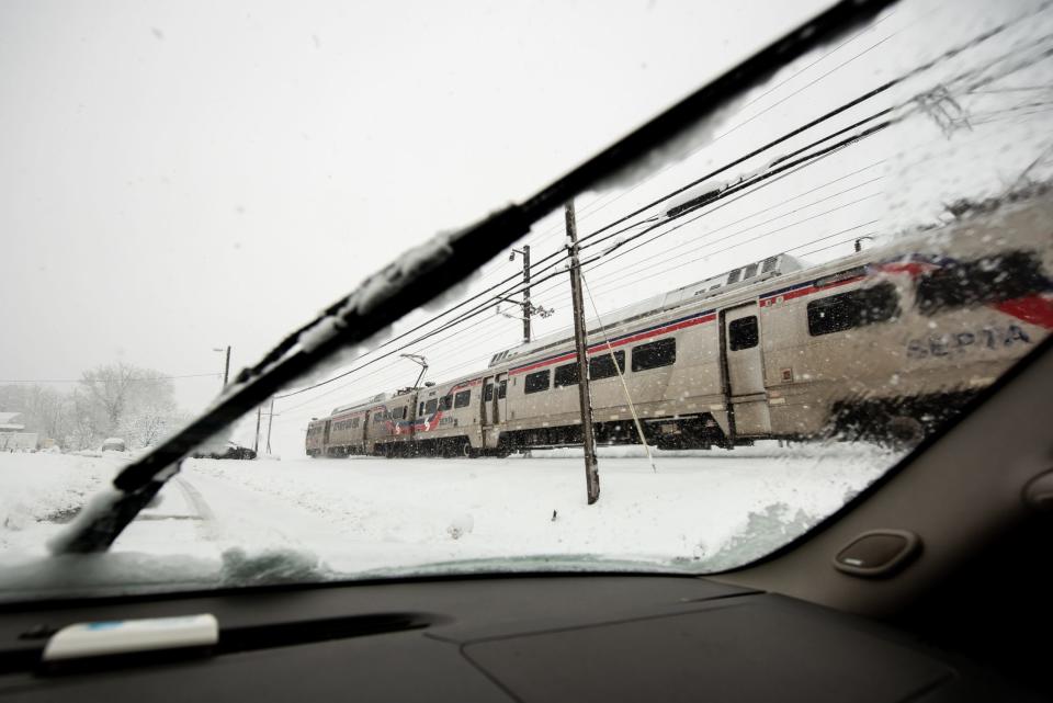 A SEPTA regional rail train passes through the Delaware Valley University campus, in New Britain Borough, on its way to Philadelphia during a snow storm Tuesday, February, 13, 2024.