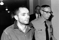 <p>Charles Manson is escorted to court for formal sentencing in Los Angeles, on April 19, 1971. He is convicted with three women followers of murder-conspiracy in the slayings of actress Sharon Tate and six others. (Photo: AP) </p>