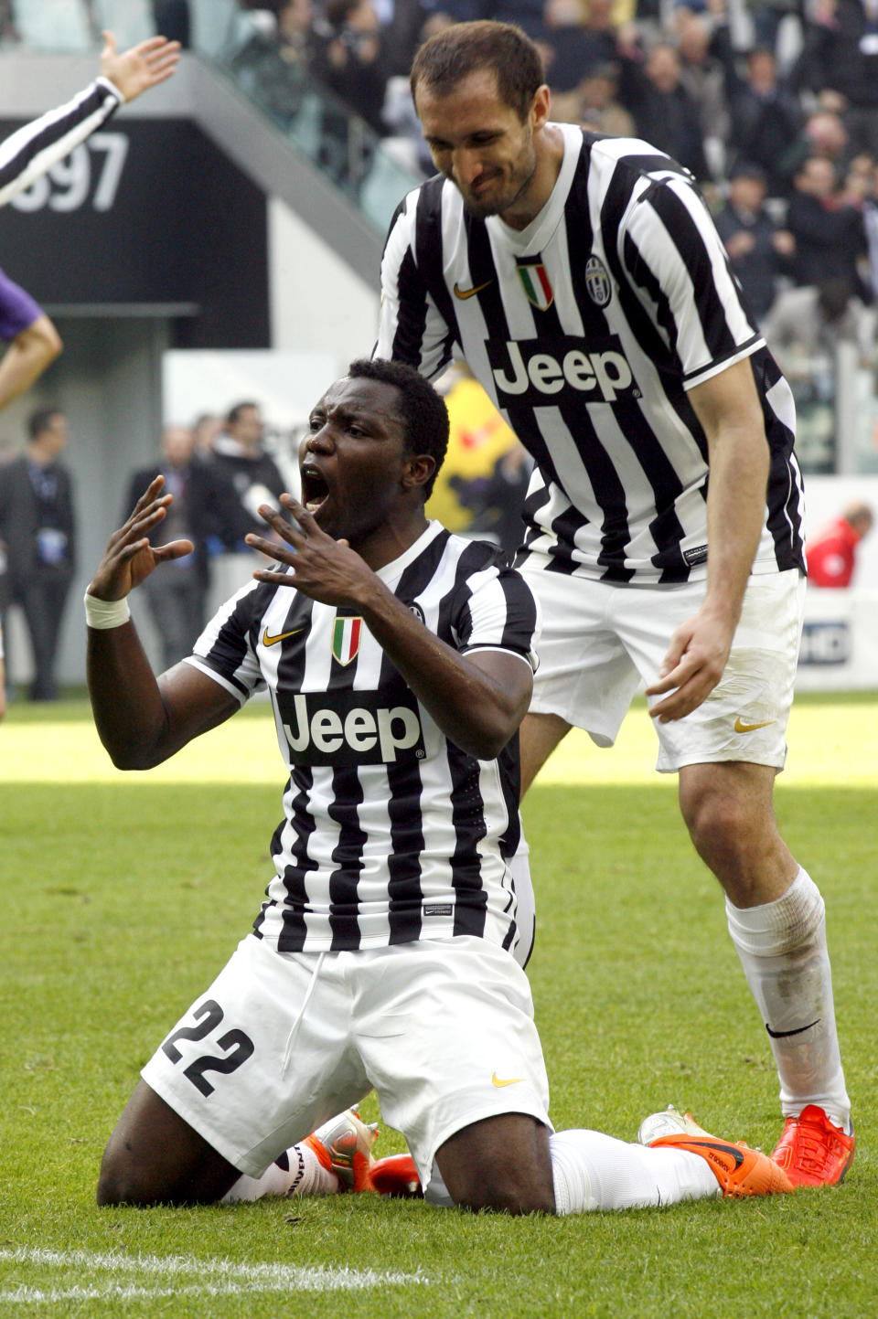 Juventus midfielder Kwadwo Asamoah, of Ghana, celebrates after scoring during a Serie A soccer match between Juventus and Fiorentina at the Juventus stadium, in Turin, Italy, Sunday, March 9, 2014. (AP Photo/Massimo Pinca)
