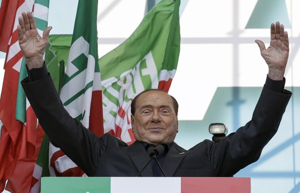 FILE - Silvio Berlusconi addresses a rally in Rome, Saturday, Oct. 19, 2019. Italy is poised to elect a new president, a figure who is supposed to serve as the nation's moral compass and foster unity by being above the political fray. Silvio Berlusconi thinks he fits the bill. (AP Photo/Andrew Medichini, File)