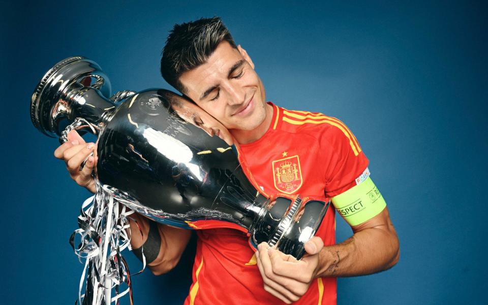 Spain captain Alvaro Morata poses with the European Championship trophy