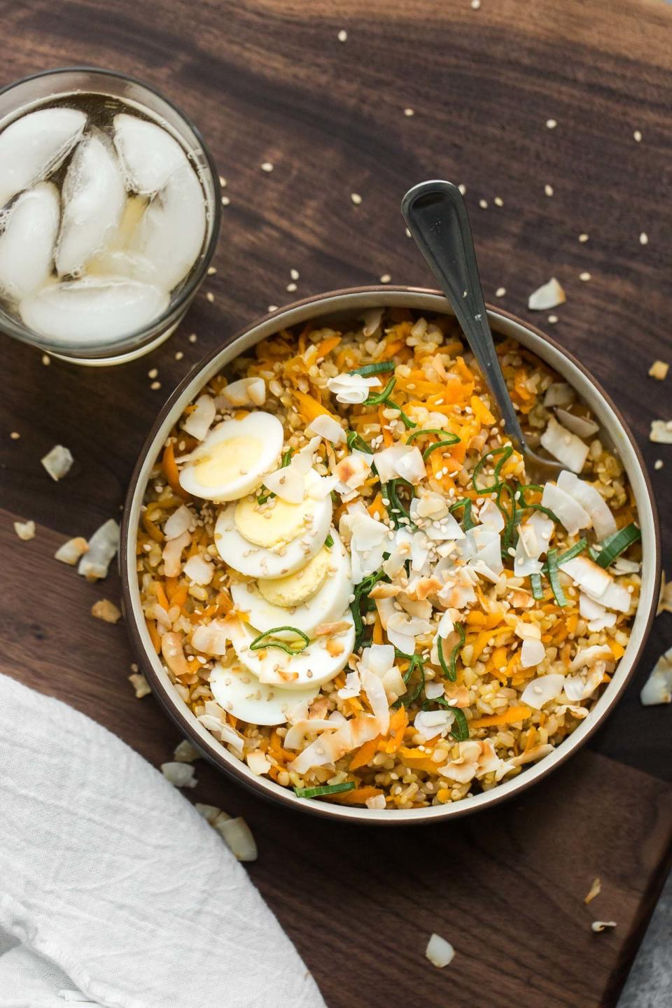 <strong>Get the <a href="https://naturallyella.com/carrot-ginger-brown-rice/" target="_blank">Ginger Brown Rice with Carrots recipe</a>&nbsp;from Naturally Ela</strong>