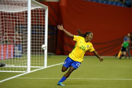 Jun 9, 2015; Montreal, Quebec, CAN; Brazil midfielder Formiga (20) celebrates a shot for a goal against Korea Republic in the first half a Group E soccer match in the 2015 FIFA women's World Cup at Olympic Stadium. Mandatory Credit: Eric Bolte-USA TODAY Sports