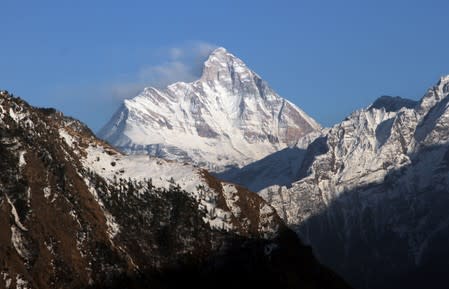 Snow-covered Nanda Devi mountain is seen from Auli town