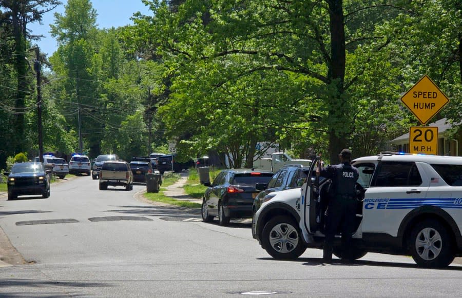 Multiple law enforcement officers were shot Monday, April 29, 2024, in east Charlotte, N.C., the Charlotte Mecklenburg Police Department said. Officers from the U.S. Marshals Task Force were conducting an investigation in a suburban neighborhood when they were fired upon, the CMPD said in a post on X, formerly Twitter. (Khadejeh Nikouyeh/The Charlotte Observer via AP)