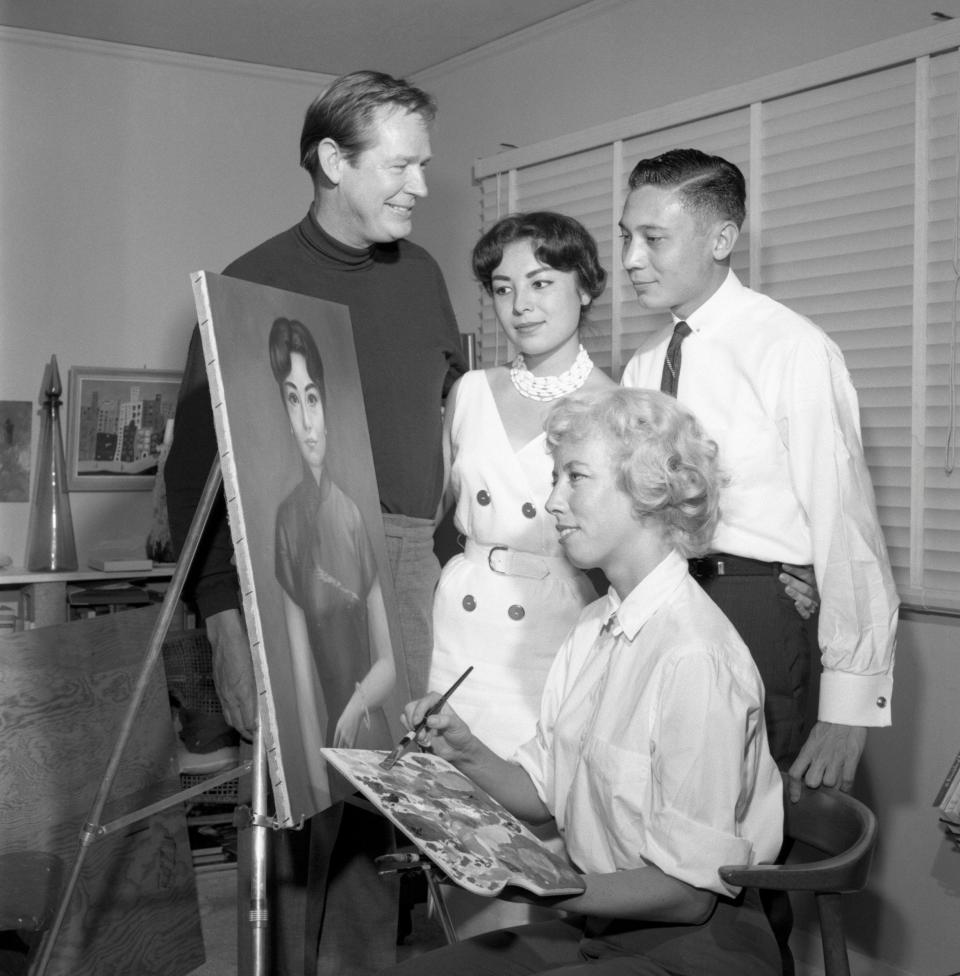 The Keanes in 1960 with the grandson of Chiang Kai-Shek and his fiancée, and her portrait - Bettmann