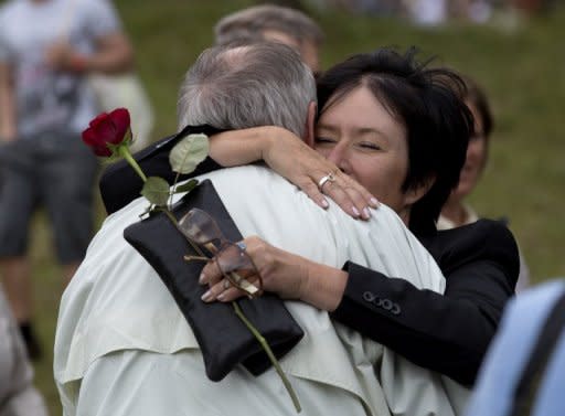 Leader of the Swedish Social Democratic Party, Mona Sahlin (R) hugs another attendee at an event on Utoeya Island on July 22, 2012 to mark the first anniversary of the attacks by right-wing extremist Anders Behring Breivik on July 22, 2011. Families of Breivik's victims disagree on whether he is sane, but ahead of Friday's verdict they say he should be locked up for life