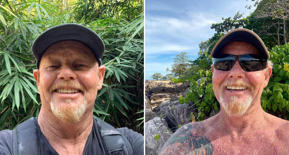 Edward Alchin takes a selfie in front of green plants at the Tiger Cave in Thailand.