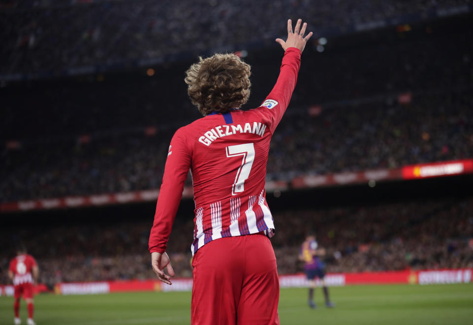 Atletico forward Antoine Griezmann reacts after putting a shot on goal straight in the arms of Barcelona goalkeeper Marc-Andre ter Stegen during a Spanish La Liga soccer match between FC Barcelona and Atletico Madrid at the Camp Nou stadium in Barcelona, Spain, Saturday April 6, 2019. (AP Photo/Manu Fernandez)