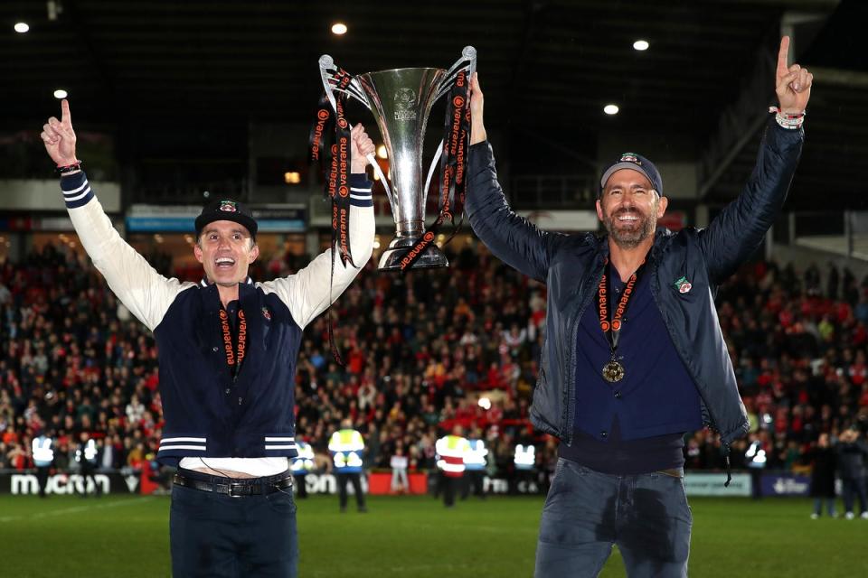 Pair celebrate as Wrexham wins the Vanarama National League and are promoted to the English Football League (Getty Images)