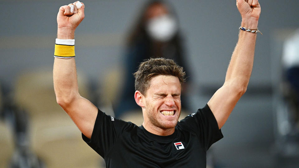 Pictured here, Diego Schwartzman celebrates his epic win against Dominic Thiem.