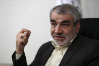 In this Nov. 9, 2019, photo, Abbas Ali Kadkhodaei, a prominent member of Iran's powerful Guardian Council, speaks in an interview with The Associated Press, in Tehran, Iran. A prominent member of Iran’s powerful Guardian Council has told The Associated Press that the Islamic Republic should stop honoring the terms of its collapsing 2015 nuclear deal with world powers amid tensions with the U.S. (AP Photo/Vahid Salemi)