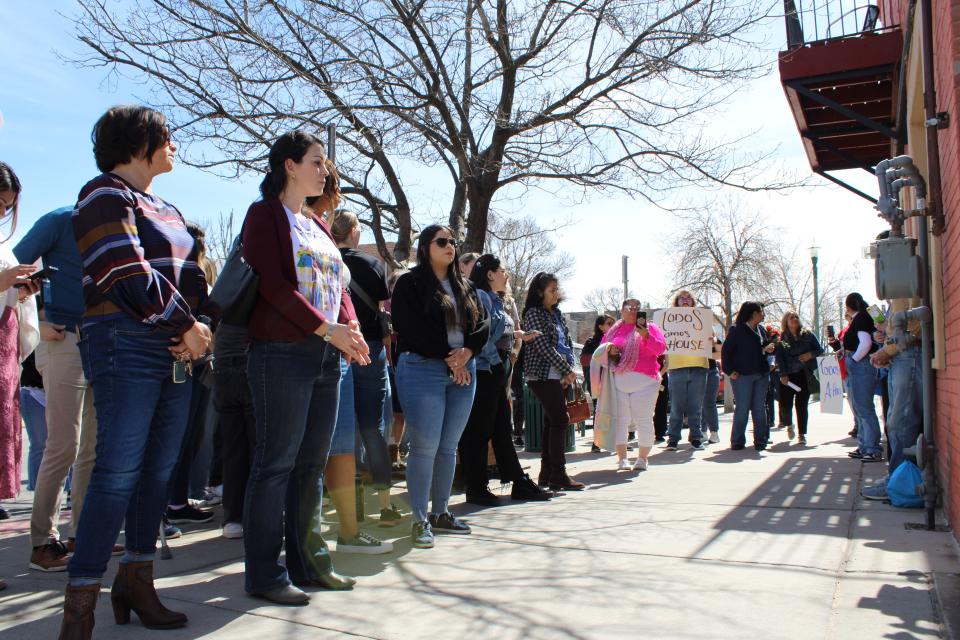 Supporters stood outside of Annunciation House's Casa Vides on Friday, Feb. 23, 2024, as inside local leaders discussed the lawsuit filed by Texas Attorney General Ken Paxton against the El Paso-based Catholic nonprofit.