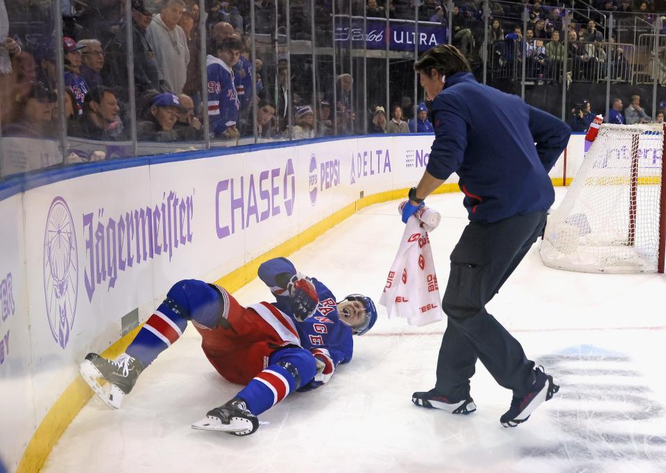 NEW YORK, NEW YORK - NOVEMBER 27: Kaapo Kakko #24 of the New York Rangers is injured during the second period against the Buffalo Sabres at Madison Square Garden on November 27, 2023 in New York City.