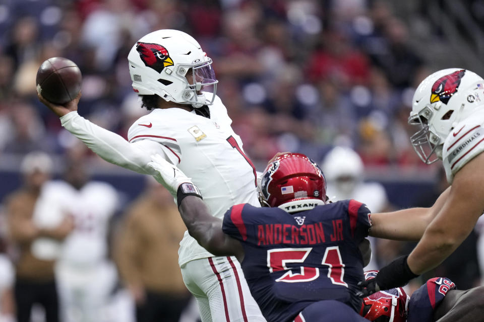 Arizona Cardinals quarterback Kyler Murray (1) throws a pass under pressure from Houston Texans defensive end Will Anderson Jr. (51) in the first half of an NFL football game in Houston, Sunday, Nov. 19, 2023. (AP Photo/Eric Christian Smith)