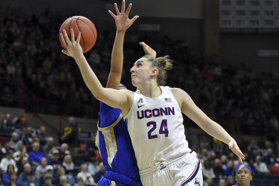 Connecticut's Anna Makurat (24) shoots during the first half of an NCAA college basketball game against Tulsa, Sunday, Jan. 19, 2020, in Storrs, Conn. (AP Photo/Stephen Dunn)